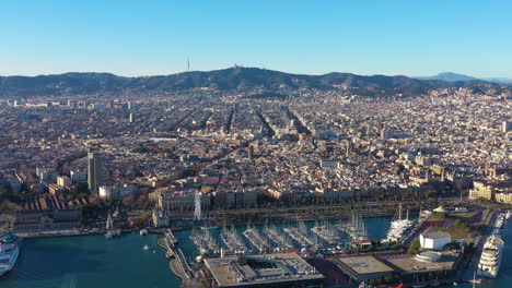 Sunset-over-Barcelona-Gothic-Quarter-aerial-harbour-and-mountains-Spain